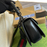 Side view of effortless structured handbag