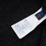 Close-up detail shot of Louis Vuitton luxury clothing with everyday silhouette