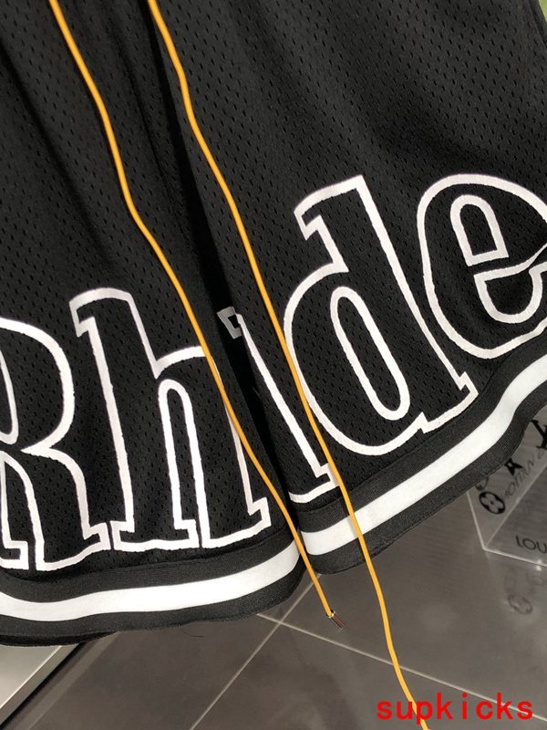 Flat lay presentation of Rhude luxury clothing with everyday silhouette