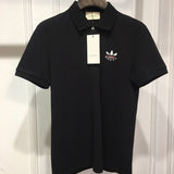 Side profile of Gucci luxury clothing with monogram-inspired silhouette
