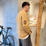 Back view of Louis Vuitton luxury clothing with signature branding
