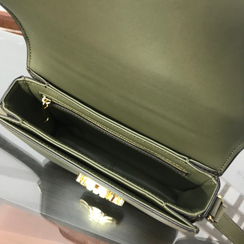 Back view of chic statement women's handbag – women's designer-style accessory