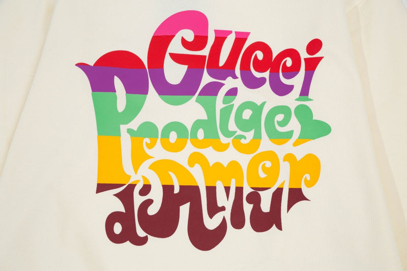 Flat lay presentation of Gucci luxury clothing with relaxed-fit cut