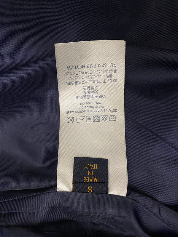 Back view of Louis Vuitton luxury clothing with everyday silhouette
