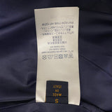 Back view of Louis Vuitton luxury clothing with everyday silhouette
