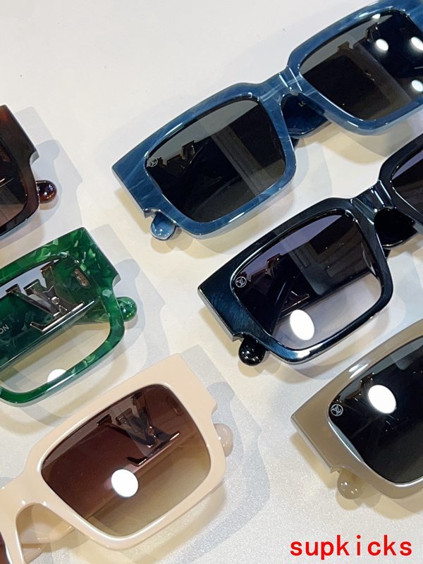 Close-up detail view of Louis Vuitton unisex sunglasses