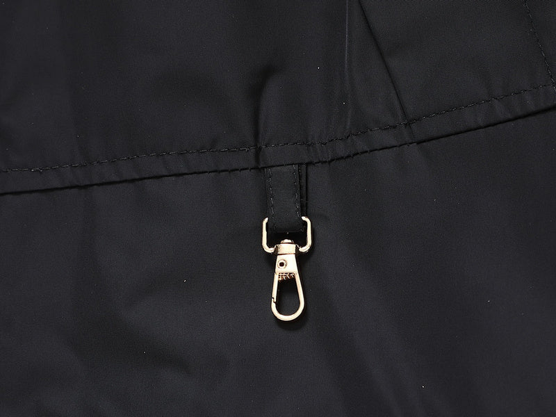 Close-up detail shot of Louis Vuitton luxury clothing with monogram-inspired silhouette
