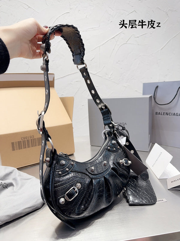 Ziva's Charm handbag – side angle view (one versatile size)