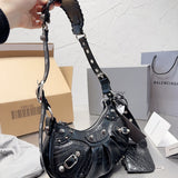 Ziva's Charm handbag – side angle view (one versatile size)