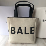 Contemporary Vegan Leather Handbag - Modern Structured Build | Women's Premium Handbag #944 - side angle view (image 2) of designer-inspired handbag