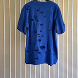 Givenchy clothing detail view — premium authentic designer style