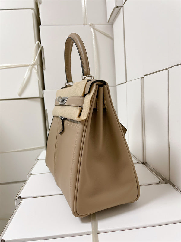 Side view of graceful structured handbag