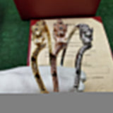 Side view of Cartier unisex jewelry piece