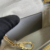 Side view of timeless structured handbag