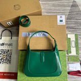 Front view of classic polished women's handbag – women's designer-style accessory