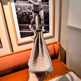 Side view of versatile structured handbag
