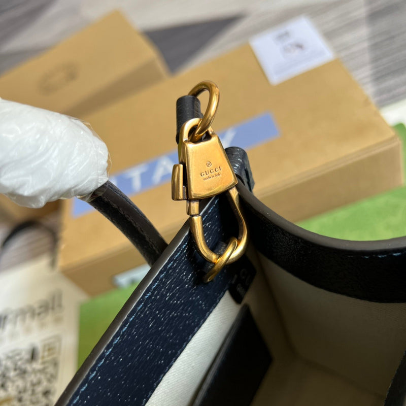 Close-up detail of sleek signature women's handbag – women's luxury handbag