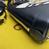 Handle and strap detail of classic structured women's handbag – women's statement bag