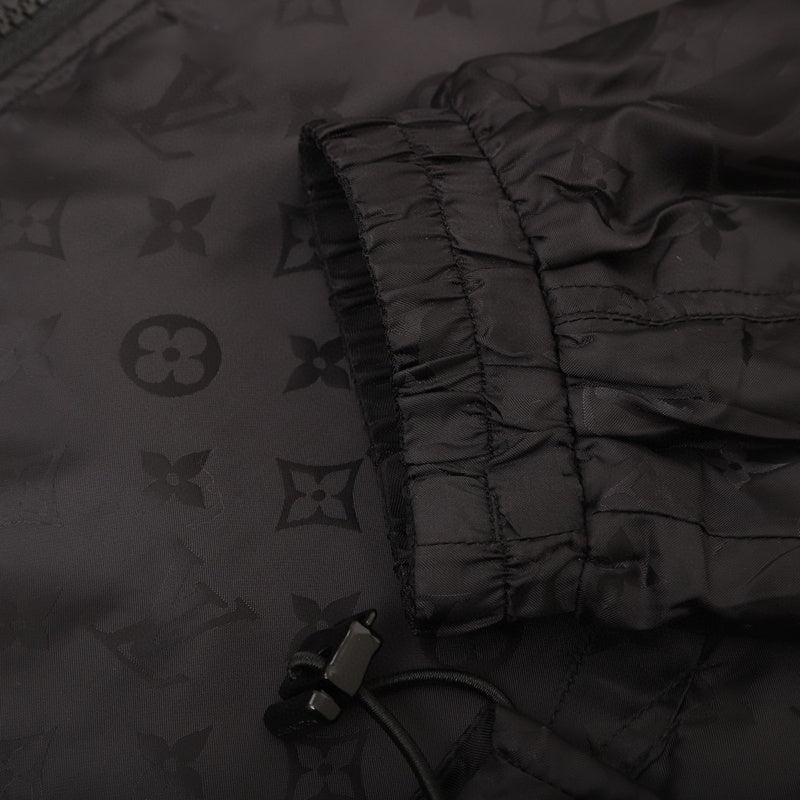 Side profile of Louis Vuitton luxury clothing with logo-detail design