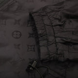 Side profile of Louis Vuitton luxury clothing with logo-detail design