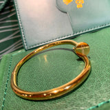 Close-up detail view of Cartier unisex jewelry piece