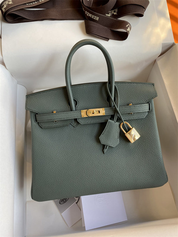 Side view of minimalist structured handbag