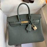 Side view of minimalist structured handbag