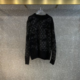 Close-up detail shot of Louis Vuitton luxury clothing with label-forward styling