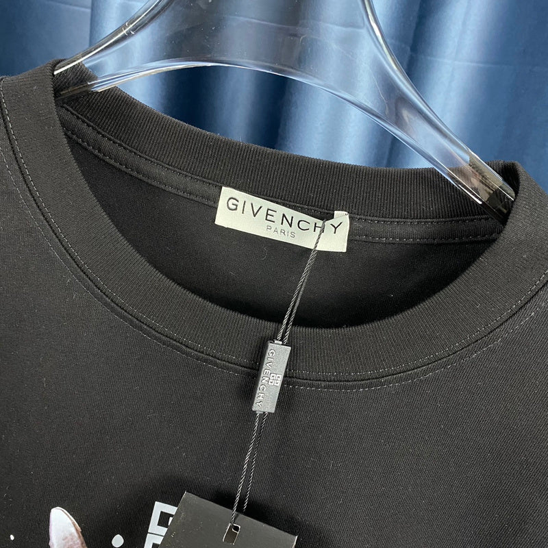 Full styled look of Givenchy luxury clothing with monogram-inspired silhouette