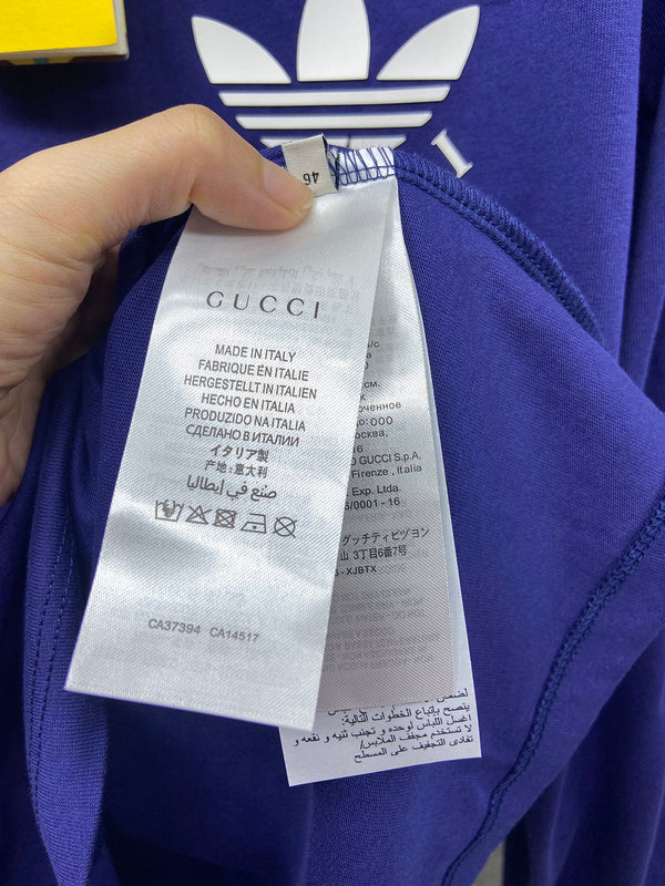 Front view of Gucci luxury clothing with logo-detail design