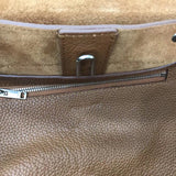 Side profile of chic statement women's handbag – women's statement bag