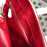 Side profile of chic polished women's handbag – women's designer-style accessory
