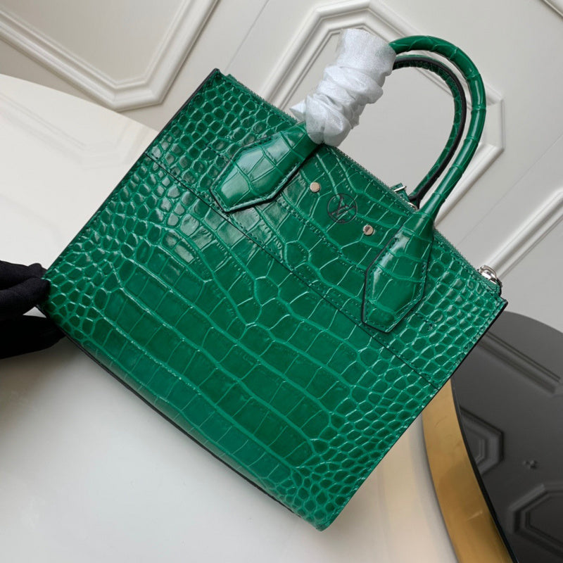 Handle and strap detail of everyday-luxe classic women's handbag – women's luxury handbag