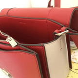 Front view of signature elevated women's handbag – women's luxury handbag