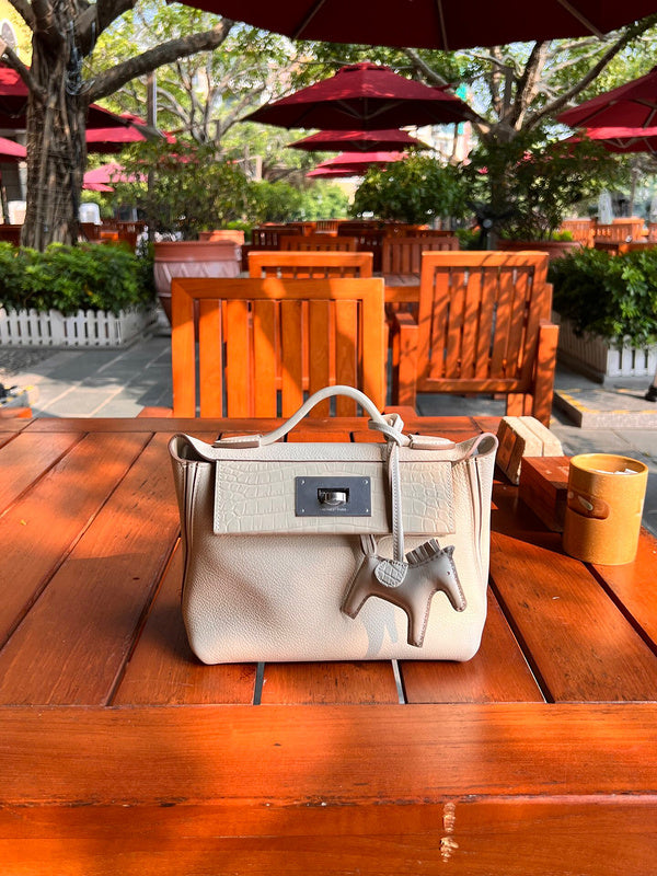 Side view of contemporary structured handbag
