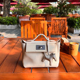 Side view of contemporary structured handbag