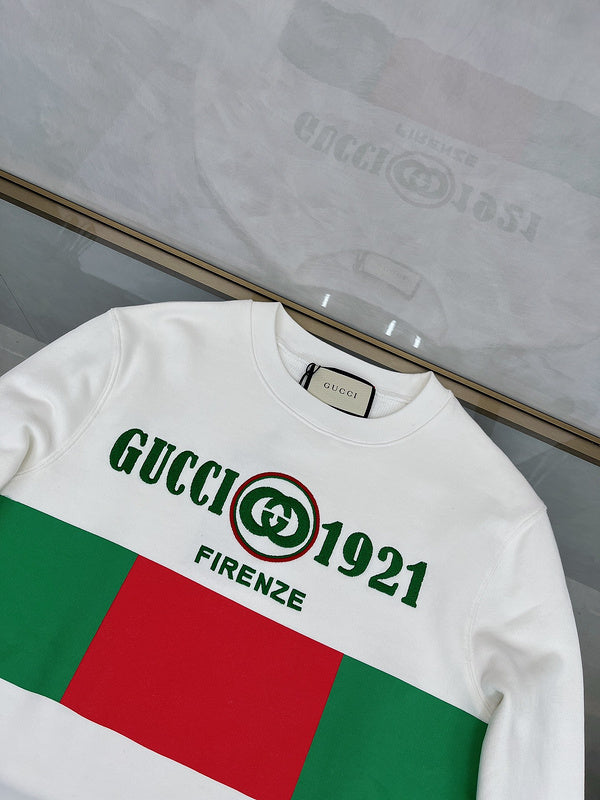 Close-up detail shot of Gucci luxury clothing with monogram-inspired silhouette
