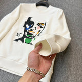 Close-up detail shot of Louis Vuitton luxury clothing with tailored silhouette