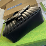 Styled lifestyle shot of structured polished women's handbag – women's statement bag