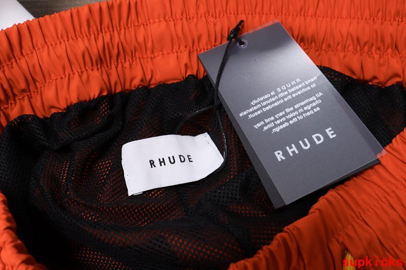 Close-up detail shot of Rhude luxury clothing with monogram-inspired silhouette