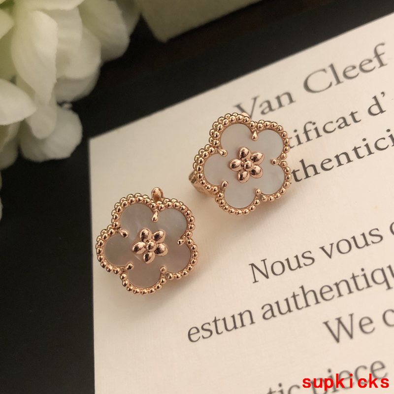 Lifestyle view of Van Cleef & Arpels unisex jewelry piece