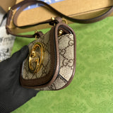 Styled lifestyle shot of statement classic women's handbag – women's luxury accessory