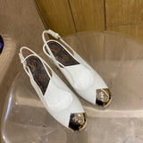 Louis Vuitton Beige Platform Heels - Angled View