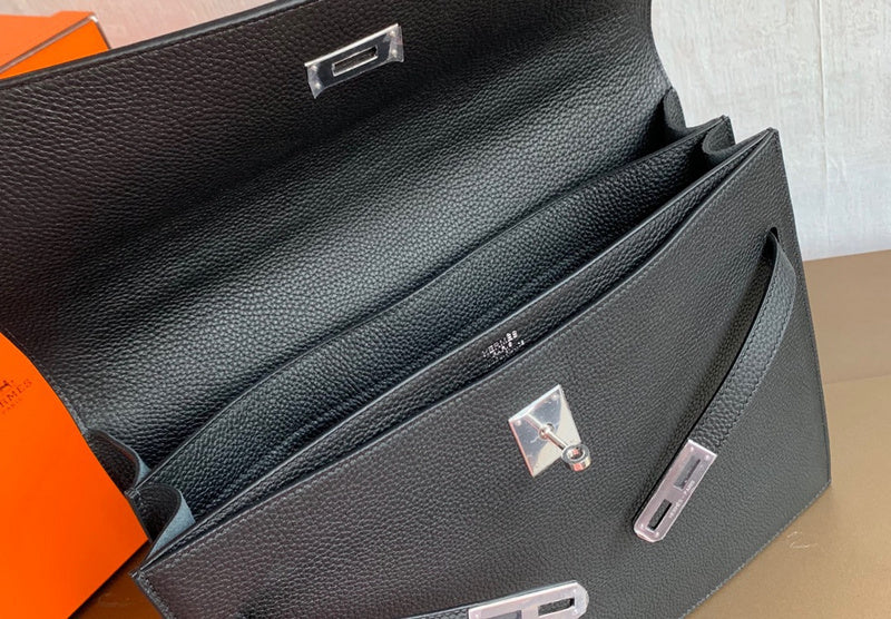 Side view of poised structured handbag