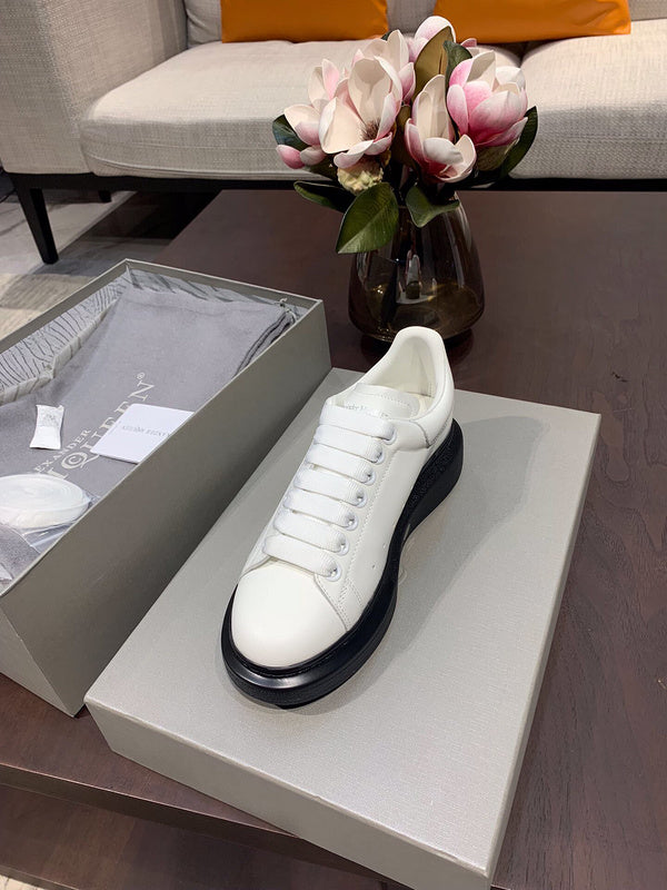 Alexander McQueen sneakers detailed view showing premium designer craftsmanship