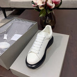 Alexander McQueen sneakers detailed view showing premium designer craftsmanship