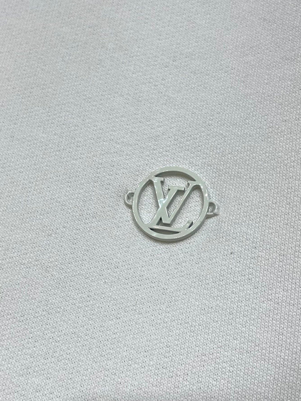 Front view of Louis Vuitton luxury clothing with signature branding