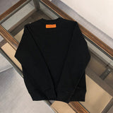 Close-up detail shot of Louis Vuitton luxury clothing with relaxed-fit cut
