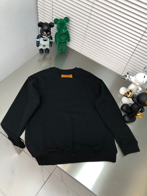 Front view of Louis Vuitton luxury clothing with signature branding