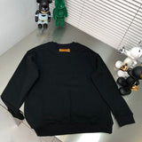 Front view of Louis Vuitton luxury clothing with signature branding